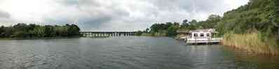 East-Hill:-1801-East-La-Rua-Street_17.jpg:  boat, pier, deck, boardwalk, island, pensacola bay, bench, crab trap, railroad trestle