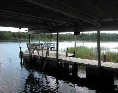 East-Hill:-1919-East-La-Rua-Street_06.jpg:  bayou, pier, dock, boat house, bench, marsh, swamp, sawgrass, 