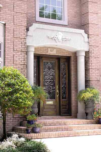 East-Hill:-617-19th-Avenue_05.jpg:  columns, leaded glass door, ferns, brick steps, pink brick house, 