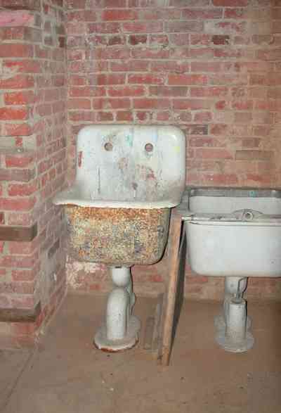 East-Hill:-Tower-East:-Old-Sacred-Heart-Hospital_44.jpg:  cellar, brickwall, porcelain sink