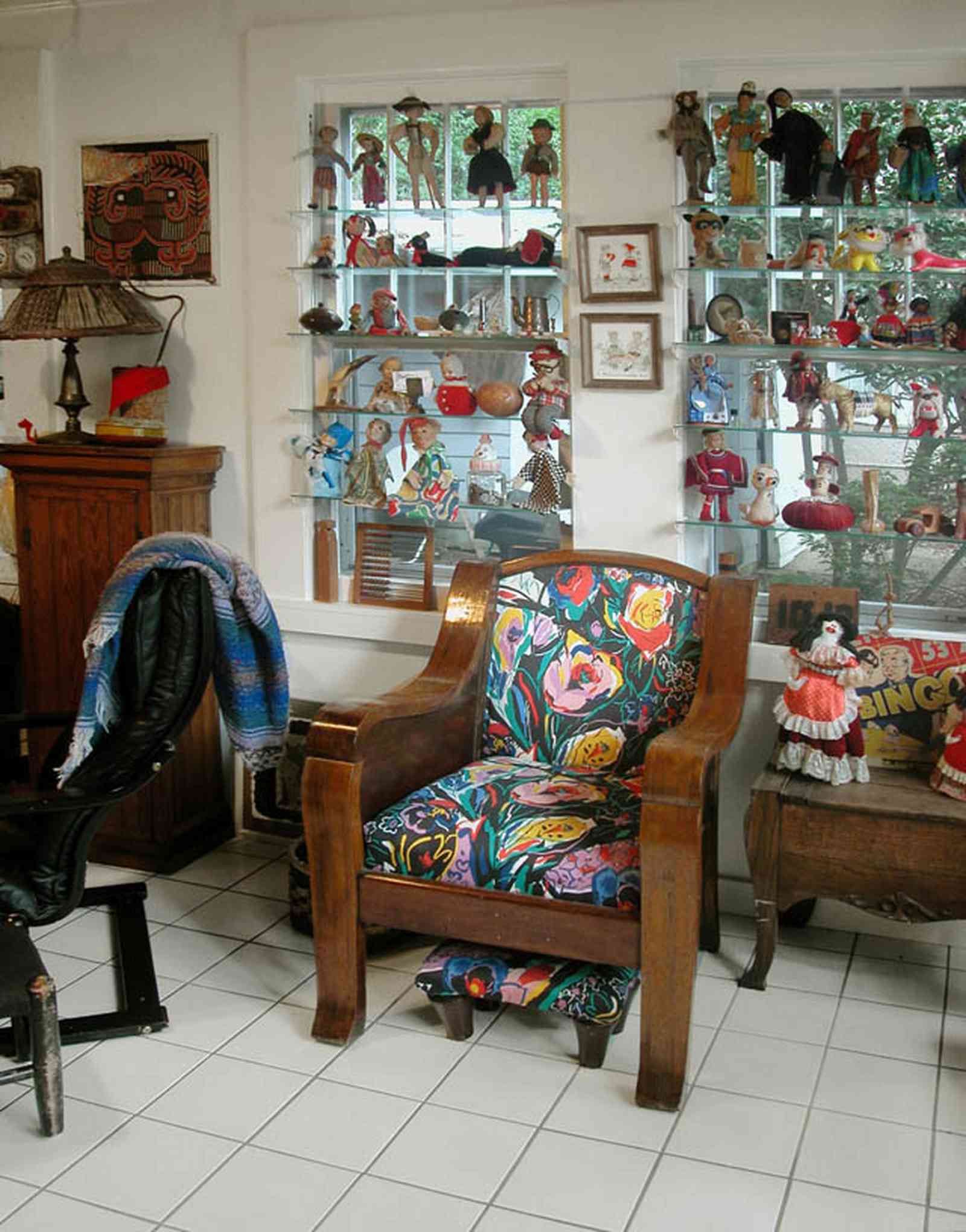 East-Pensacola-Heights:-600-Bayou-Blvd_18.jpg:  antique dolls, antique toys, ceramic tile floors, family room