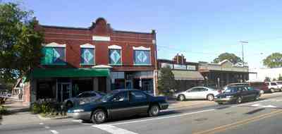 Foley:-Downtown_03.jpg:  storefront, model t-ford, drugstore, pharmacy, downtown, small town america, alabama, soda shop, flower garden