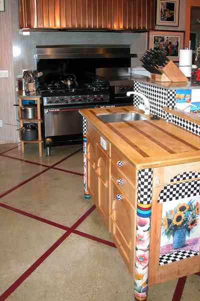 Gulf-Breeze:-92-High-Point-Drive_08.jpg:  sink, sideboard, restaurant stove, knife block, tile floor, coffee grinder