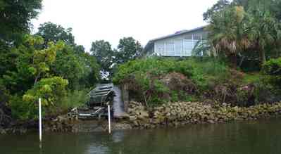 Gulf-Breeze:-Navy-Cove-House_13.jpg:  gulf coast, gulf breeze, gulf of mexico, dock, boat, palm tree, mimosa tree,  house, deck, channel, escambia bay, river, tree, shoreline, dead mans island