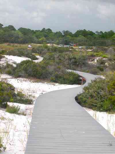 Gulf-Islands-National-Seashore:-Dunes-Nature-Trail_04.jpg:  walkway, boardwalk, parking lot, quartz sand, dunes, gulf of mexico, barrier island