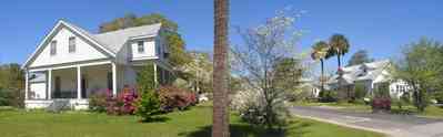 Milton:-Historic-District:-Escambia-St-House_02.jpg:  palm tree, azalea bushes, victorian house