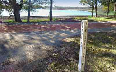 Milton:-Red-Brick-Road_01.jpg:  brick road, historic marker, highway, two-lane road, red brick