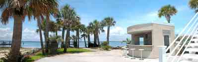 Navarre:-7332-Grand-Navarre-Blvd_03.jpg:  cabana, stairs, palm trees, santa rosa sound