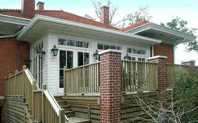 North-Hill:-116-DeSoto-St_03a.jpg:  brick pillars, french doors, back porch, transom, chimney, deck