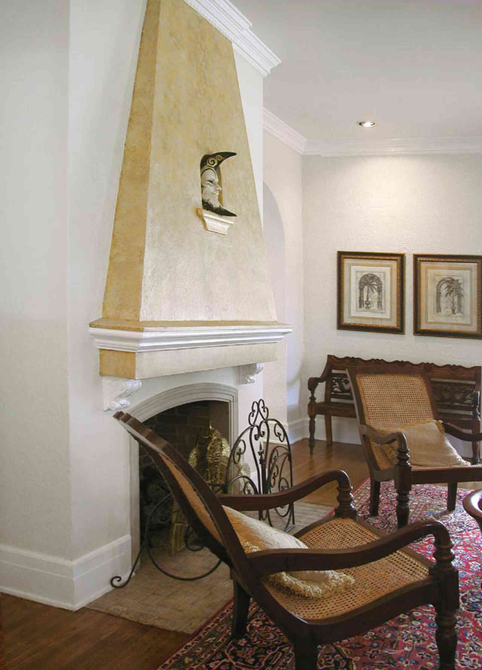North-Hill:-123-West-Lloyd-Street_07.jpg:  fireplace, oriental rug, venetian mask, mantel, fireplace