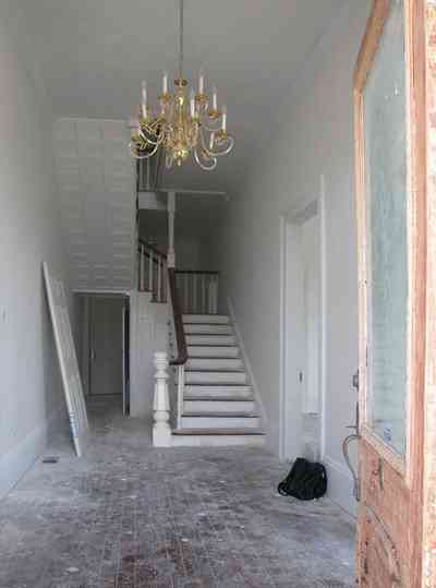 North-Hill:-200-West-Jackson-Street_02.jpg:  chandelier, heart-pine floors, etched glass door, staircase, victorian style, balloon frame construction