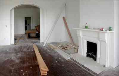 North-Hill:-200-West-Jackson-Street_04.jpg:  heartpine floors, mantel, fireplace, pocket doors, victorian home, arched door frame