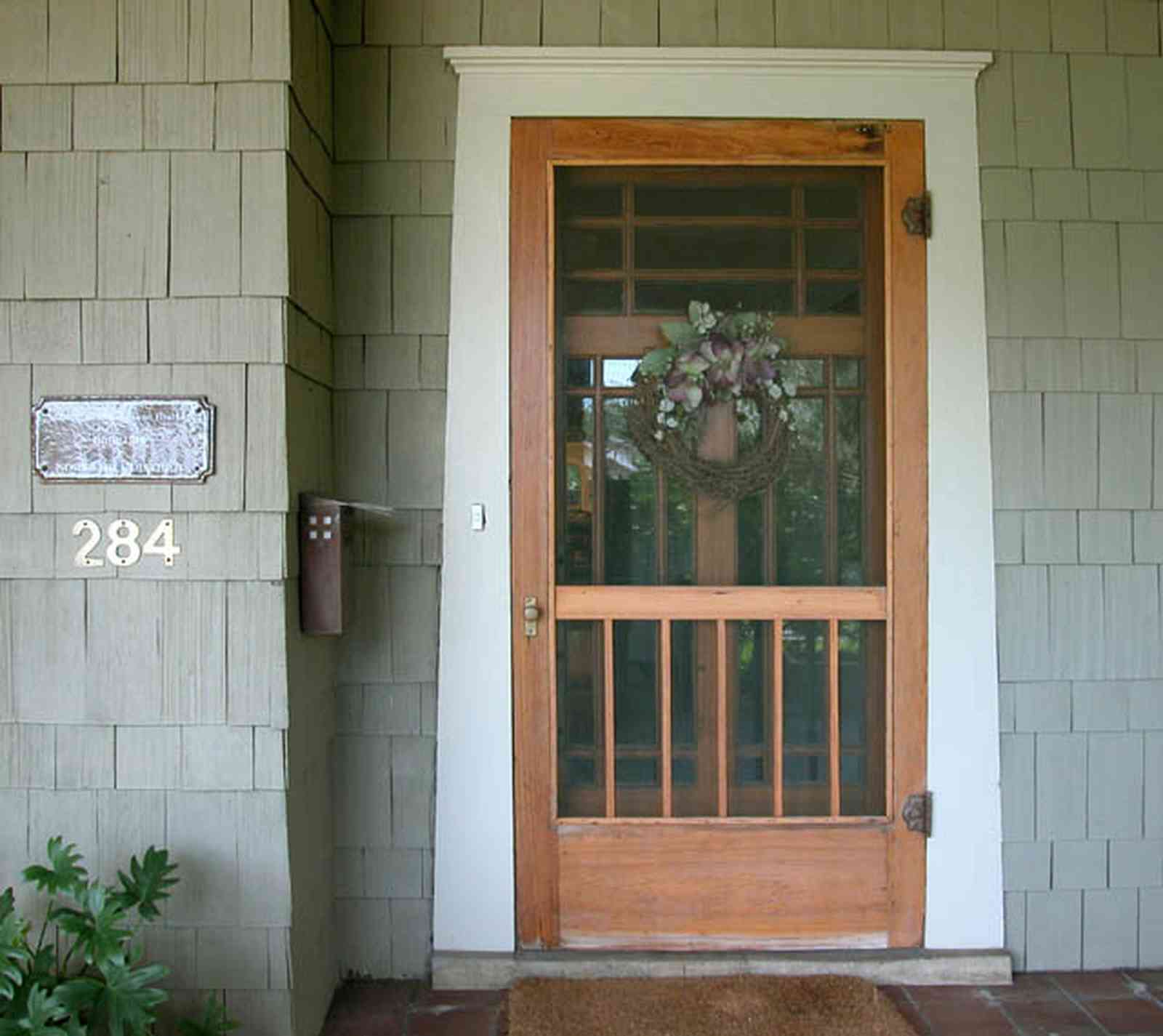North-Hill:-284-West-Gonzales-Street_14.jpg:  screen door, front door, shake siding, craftsman cottage