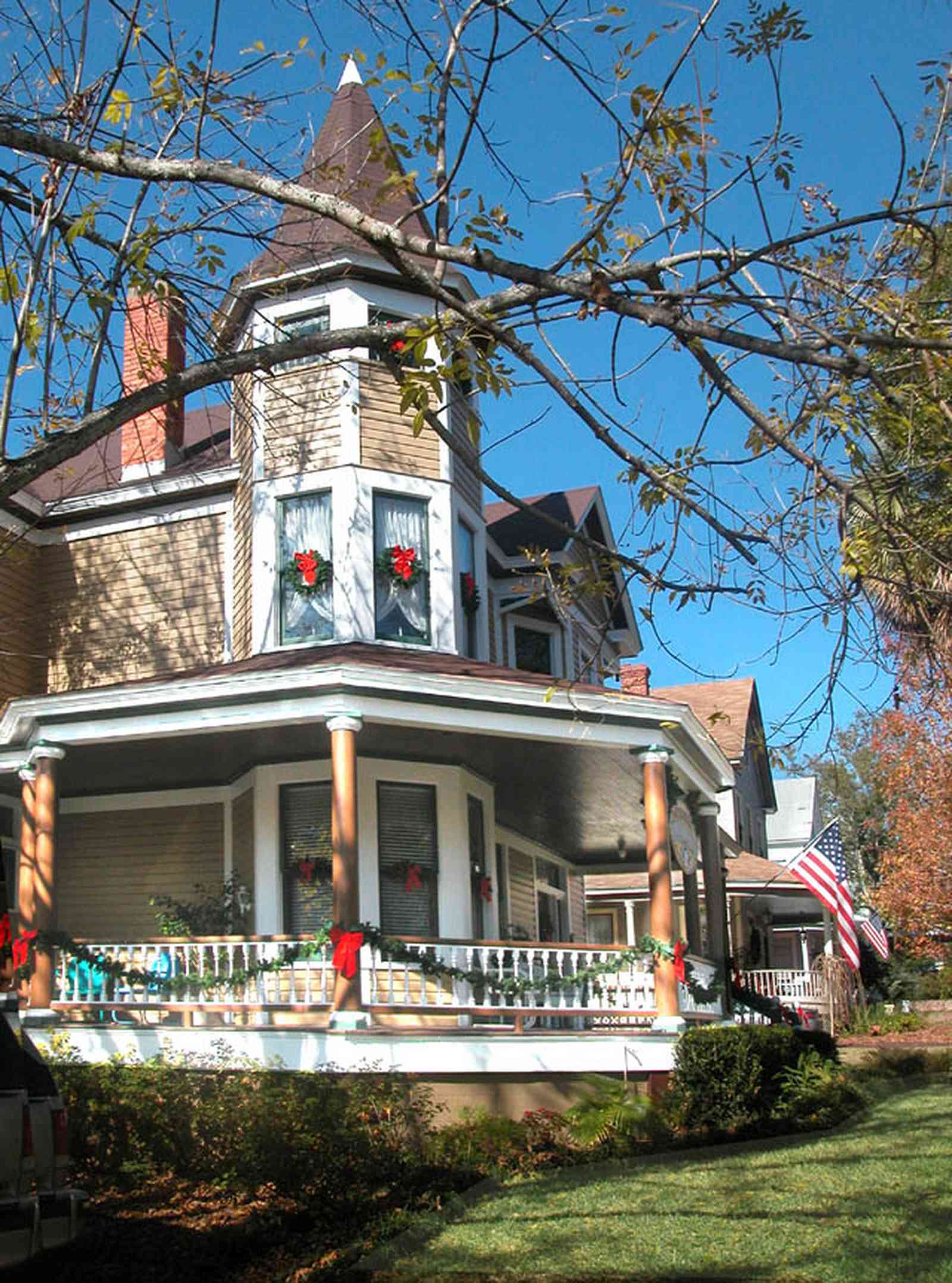 North-Hill:-Springhill-Guest-House_02.jpg:  victorian house, front porch, columns, turret, fireplace, guest house, hotel, bed and breakfast, 