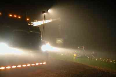 Oak-Grove:-Carpenters-Catfish-Farm_27.jpg:  catfish harvest, pond, 18 wheeler, catfish cruiser, boat, net, seine