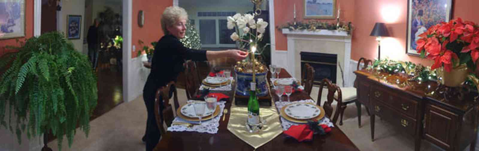 Pace:-Floridatown_08.jpg:  dining room, gloria taylor, candles, poinsetta, fireplace