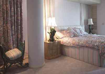 Pensacola-Beach:-1212-Ariola-Drive_10.jpg:  master bedroom, fish lamps, 50's lamps, dense carpet, beach house