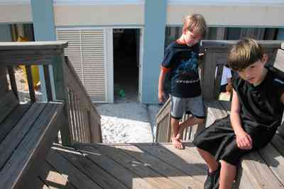 Pensacola-Beach:-1212-Ariola-Drive_30.jpg:  stairs, deck, louvered door, bench, pensacola beach, quartz sand