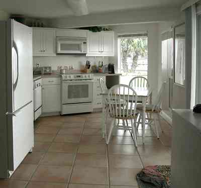 Pensacola-Beach:-225-Sabine-Drive_15.jpg:  palm trees, sea oats, driveway, beach house, escambia county, sabine bay