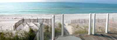 Pensacola-Beach:-Ariola-Drive-Art-Deco-House_06.jpg:  sand, crystal sand, white sand, sugar sand, sea oats, bauhaus architectural style, palm trees, dune restoration, beachfront property