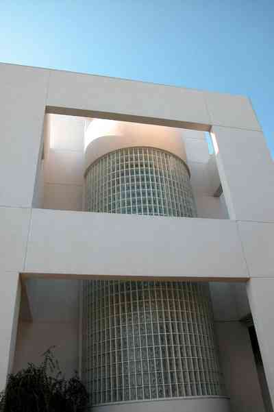 Pensacola-Beach:-Ariola-Drive-Art-Deco-House_16.jpg:  sand, crystal sand, white sand, sugar sand, sea oats, bauhaus architectural style, palm trees, dune restoration, stairs, glass railing, wooden deck, glass blocks, beachfront property