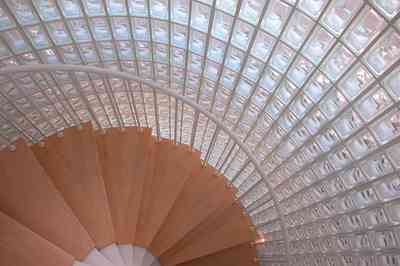 Pensacola-Beach:-Ariola-Drive-Art-Deco-House_21.jpg:  sand, crystal sand, white sand, sugar sand, sea oats, bauhaus architectural style, palm trees, dune restoration, stairs, glass railing, wooden deck, front door, staircase, glass blocks,  beach front property