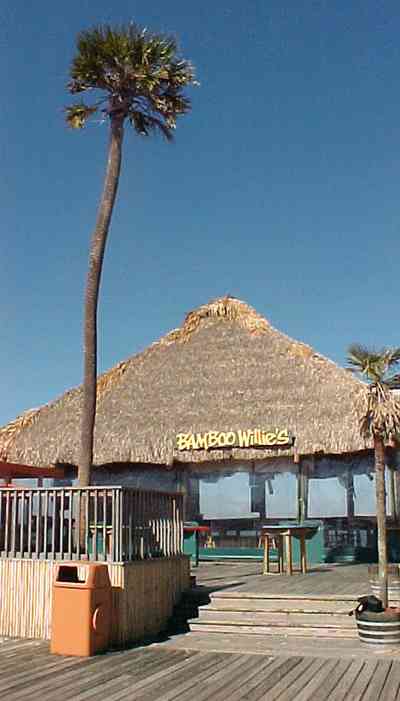 Pensacola-Beach:-Bamboo-Willies_02.jpg:  bamboo hut, tropical island, palm trees, bar, restaurant, alcohol, gulf of mexico, sound