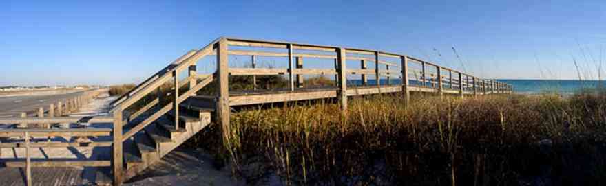 Pensacola-Beach:-Escambia-County-Parking-Lot_02.jpg:  boardwalk, walkover, sea oats, cordgrass, parking lot, gulf of mexico