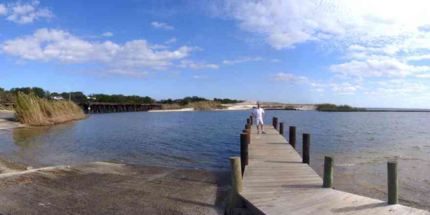 Pensacola:-Gateway-District:-17th-Avenue-Boat-Launch_01.jpg:  boat launch, pier, dock, island, sea grass, railroad trestle, tom roush