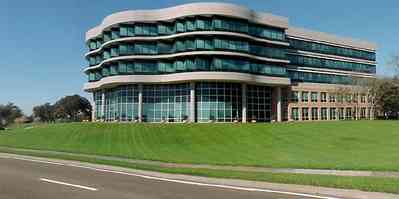 Pensacola:-Gateway-District:-Gulf-Power-Headquarters_02.jpg:  corporate headquarters, office building, bayfront parkway, Hawkshaw neighborhood, oak tree, 