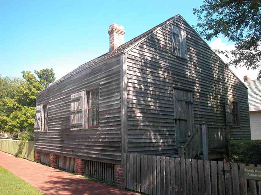 Pensacola:-Historic-Pensacola-Village:-Julee-Cottage_00b.jpg:  brick sidewalk, wood shingle roof, shutters, picket fence, freewoman of color, musuem