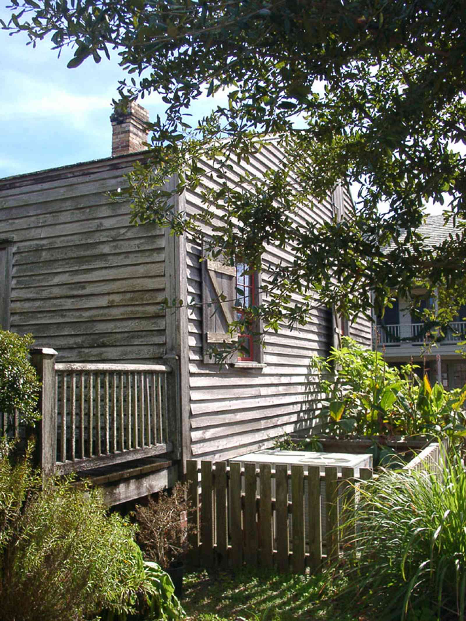 Pensacola:-Historic-Pensacola-Village:-Julee-Cottage_07.jpg:  slave cottage, picket fence, back porch, slave quarters, pensacola historic village, tivoli house