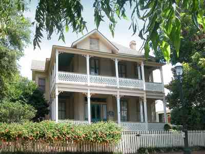 Pensacola:-Historic-Pensacola-Village:-Lear-Rocheblave-House_02a.jpg:  victorian home, front porch, picket fence, pecan tree, wood shingle roof