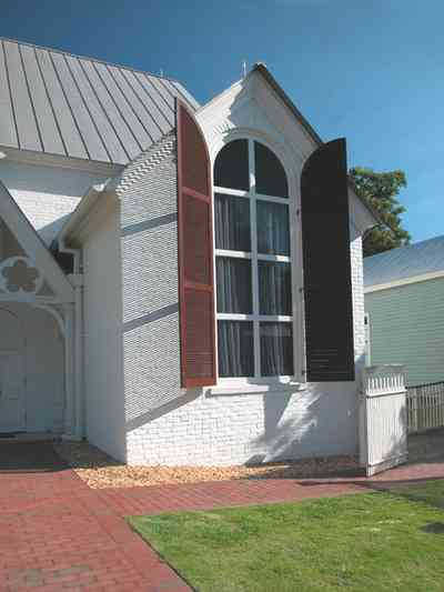 Pensacola:-Historic-Pensacola-Village:-Old-Christ-Church_04.jpg:  plaque, historic marker, brick structure, religious service, church house, victorian village