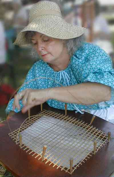 Pensacola:-Historic-Pensacola-Village:-The-Weavers-Cottage_07.jpg:  weaver, reenactor, quilting, caning, bonnet, historic reenactment