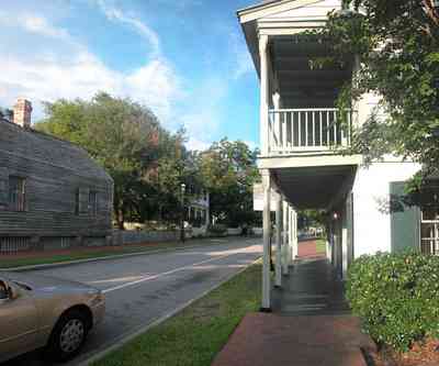 Pensacola:-Historic-Pensacola-Village:-Tivioli-House_00a.jpg:  brick sidewalk, porch, balcony, arcade, victorian house