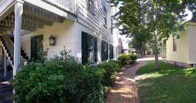 Pensacola:-Historic-Pensacola-Village:-Tivioli-House_01d.jpg:  brick sidewalk, staircase,  victorian house, weavers cottage