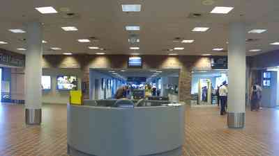 Pensacola:-Regional-Airport_05.jpg:  airport, concourse, information desk, terminal, jet plane