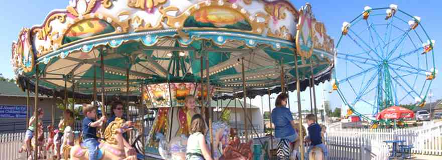 Pensacola:-Sams-Fun-City_03.jpg:  merry-go-round, ferris wheel, amusement park