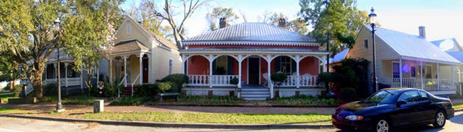 Pensacola:-Seville-Historic-District:-433-East-Zaragoza-Street_02.jpg:  pyramidal roof, four-square georgian architectural style, victorian house, victorian front porch, historic village