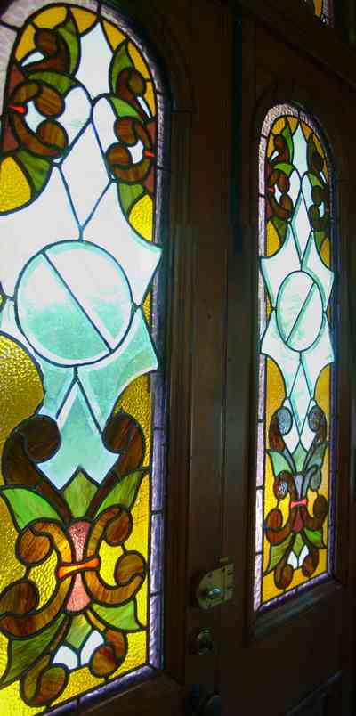 Pensacola:-Seville-Historic-District:-433-East-Zaragoza-Street_41.jpg:  victorian house, stained glass door