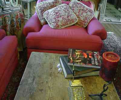 Pensacola:-Seville-Historic-District:-433-East-Zaragoza-Street_42.jpg:  victorian house, sofa, coffee table, oriental rug, wooden floors