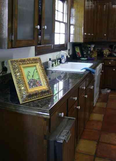Pensacola:-Seville-Historic-District:-BW-Properties_17.jpg:  kitchen cabinet, granite countertops, tile floor
