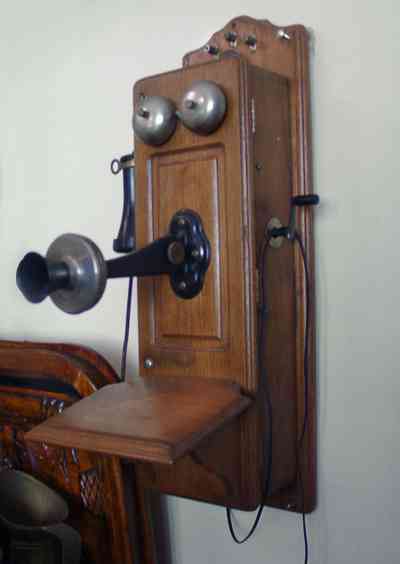 Pensacola:-Seville-Historic-District:-BW-Properties_18.jpg:  folk victorian home, crank wall telephone, kitchen