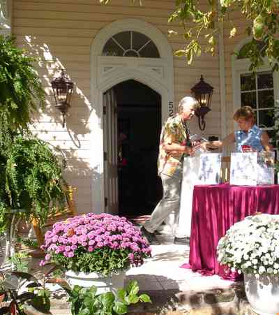 Pensacola:-Seville-Historic-District:-BW-Properties_31.jpg:  victorian home, folk victorian house, chrysanthamums, tickets, historic district, tour of homes