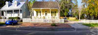 Pensacola:-Seville-Historic-District:-Chloe-And-Sophies-Attic_03.jpg:  victorian house, antique shop, white picket fence, pecan trees, four-square georgian house, shutters, 