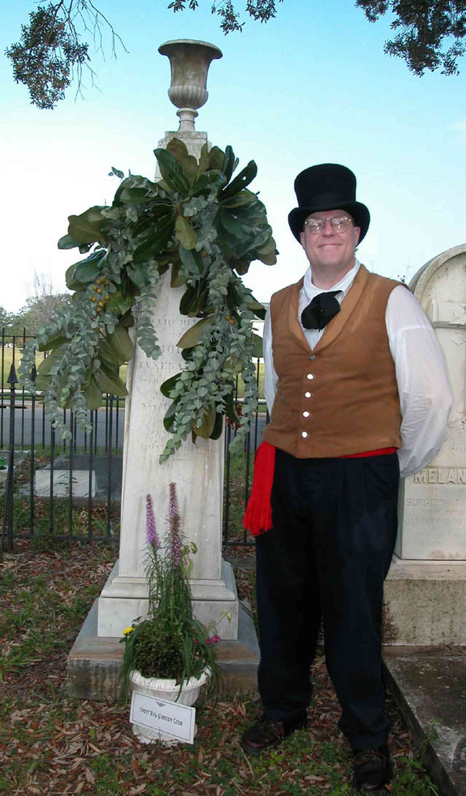 Pensacola:-Seville-Historic-District:-St-Michael-Cemetery_38.jpg:  tombstone, wreath, floral tribute, gravesite, commerorative marker, marble tombstone