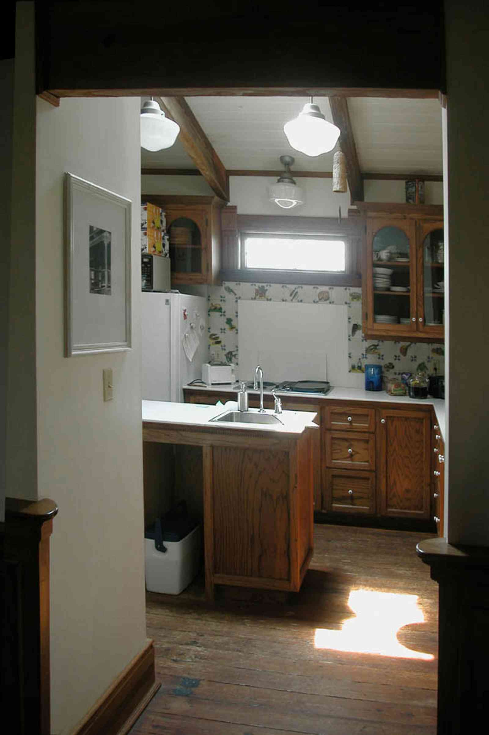 Perdido-Key:-Gothic-House_08k.jpg:  kitchen, cabinets, ceramic tile, pine floors, heartpine lumber