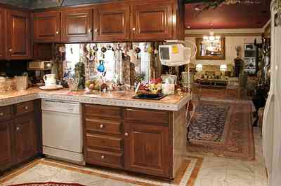 Scenic-Highway:-3780-Scenic-Ridge-Drive_02f.jpg:  kitchen, marble floor, oriental rug, wooden cabinets, opulent detail, mansion