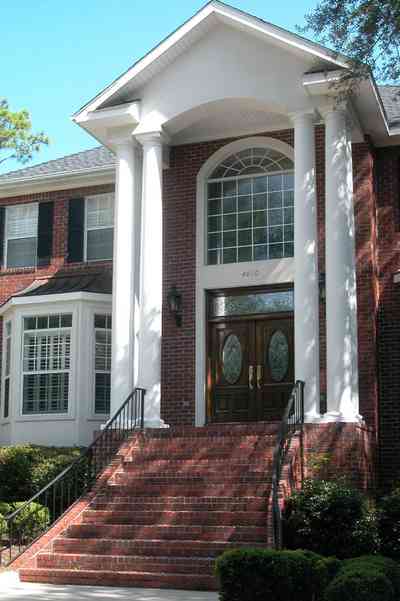 Scenic-Highway:-4220-Montalvo-Street_05.jpg:  colonial architectural style, white columns, shutters, crown molding pediment, circular driveway, carriage lamp, sycamore tree, etched glass door, box hedge, 